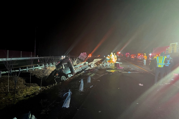 Emergency personnel at the scene of a crash on Interstate 64 in York County, Va.
