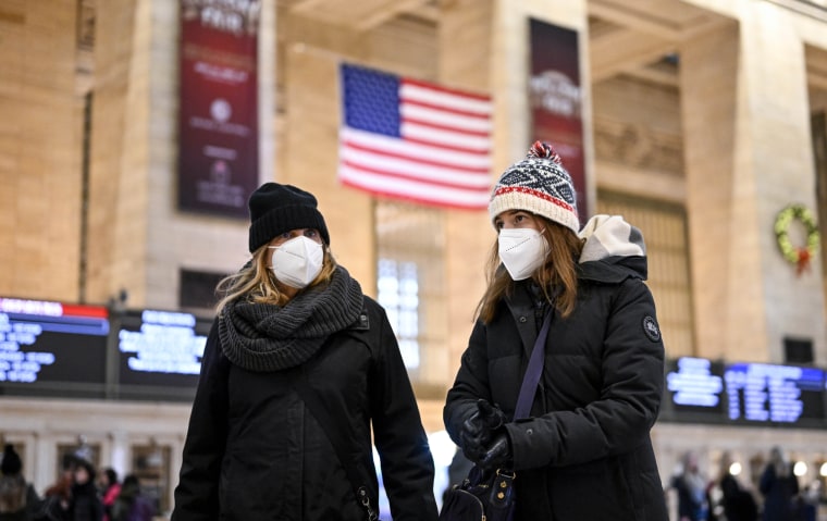 People wearing masks inside Grand Central Terminal in New York