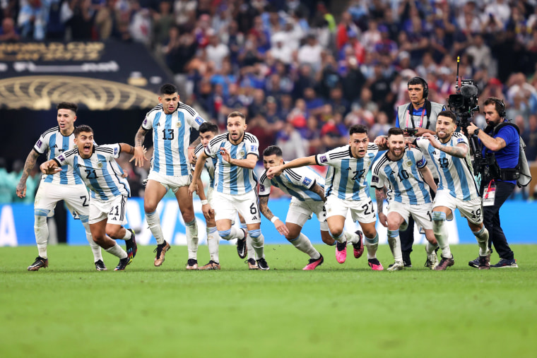 Argentina players celebrate the fourth and winning penalty by Gonzalo Montiel in the penalty shootout during the World Cup final against France on Dec. 18, 2022, in Lusail City, Qatar.