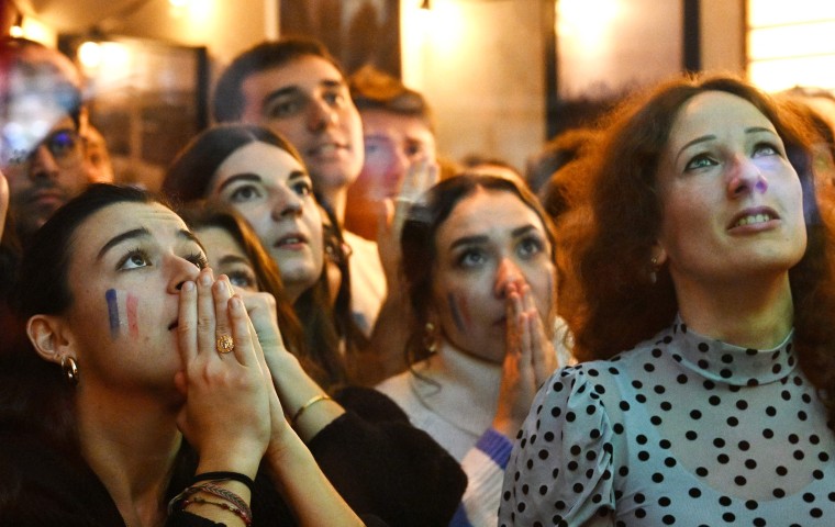 Fans watch the World Cup final in Paris on Dec. 18, 2022.