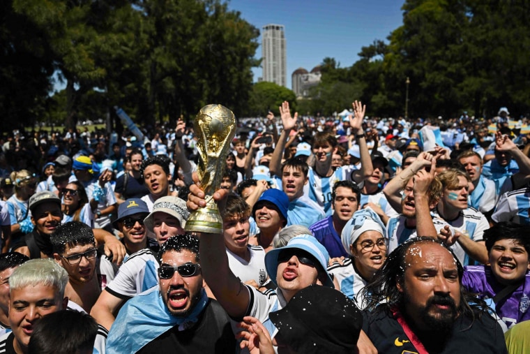 Fans of Argentina cheer before watching the live broadcast of the Qatar 2022 World Cup final football match between Argentina and France in Buenos Aires on Dec. 18, 2022.
