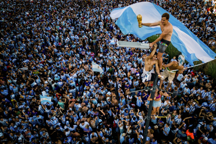 Fans in Buenos Aires celebrate Argentina win the soccer World Cup 2022 in Qatar. 