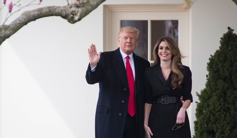 Image: President Donald J. Trump waves beside White House Communications Director Hope Hicks as he walks from the Oval Office to board Marine One to depart from the South Lawn of the White House 