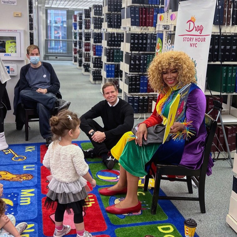 NYC Councilmember Erik Bottcher, center, seated on the floor, during  Drag Queen Story Hour in Chelsea