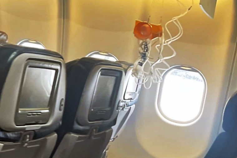 Oxygen masks on a Hawaiian Airlines plane after severe turbulence injured passengers on Sunday.