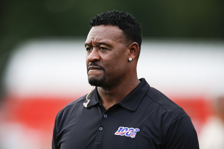 Former NFL player Willie McGinest watches the Cleveland Browns during practice on July 31, 2019, in Berea, Ohio.