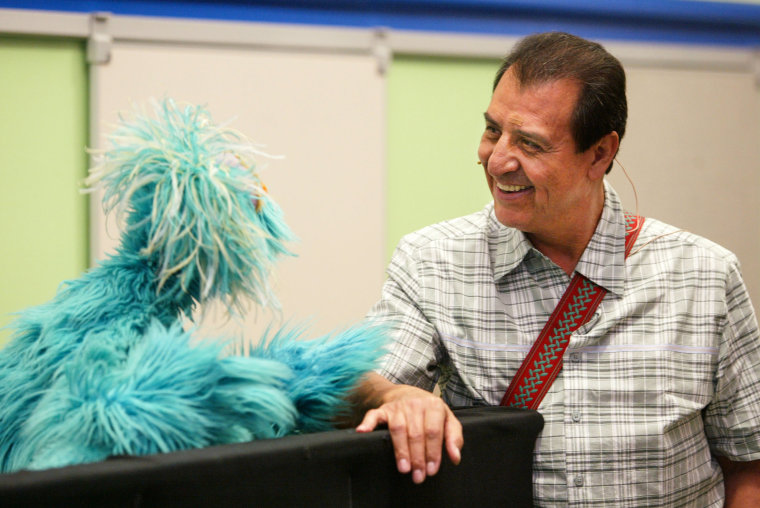 Rosita chats with Luis, played by Emilio Delgado, during Sesame Street's "You Can Ask!" program on June 25, 2003, in New York.