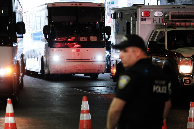 A bus carrying migrants arrives into the Port Authority bus station in New York City in Aug. 2022.