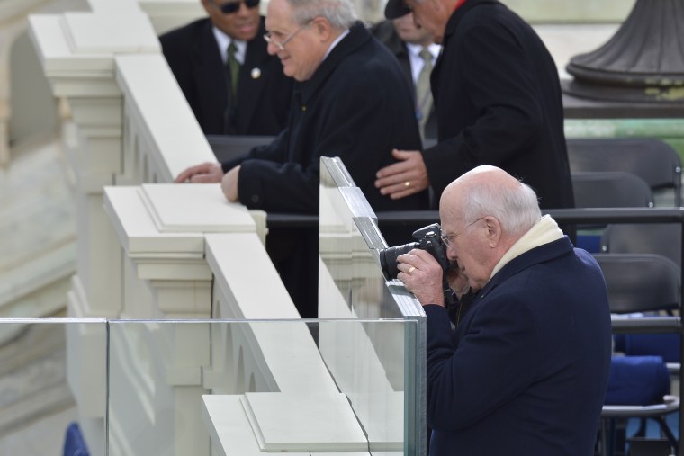 Sen. Patrick Leahy, D-Vt., takes photos at the inaugural booth during the Presidential Inauguration Ceremony for Barack Obama on Capitol Hill