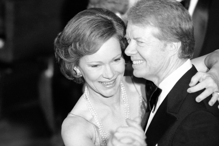 FILE - In this Dec. 13, 1978 file photo, President Jimmy Carter and his wife Rosalynn lead their guests in dancing at the annual Congressional Christmas Ball at the White House in Washington. Jimmy Carter and his wife Rosalynn celebrate their 75th anniversary this week on Thursday, July 7, 2021. (AP Photo/Ira Schwarz, File)