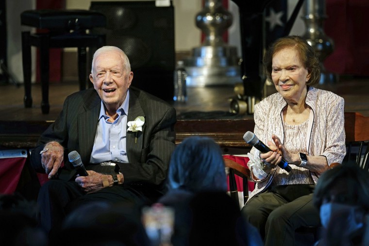 FILE - Former U.S. President Jimmy Carter and his wife, former first lady Rosalynn Carter, sit together during a reception to celebrate their 75th wedding anniversary on Saturday, July 10, 2021, in Plains, Ga. On Thursday, Aug. 18, 2022, Carter, the second-oldest U.S. first lady ever, turns 95. (AP Photo/John Bazemore, Pool, File)