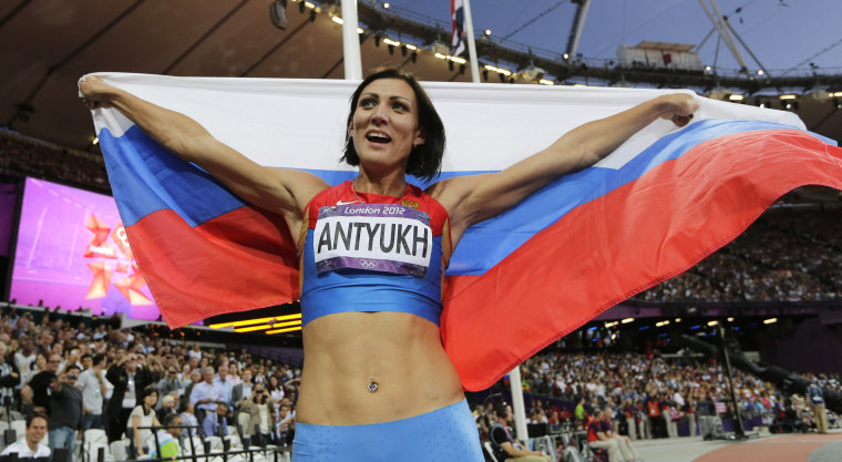Natalya Antyukh celebrates after winning gold in the women's 400-meter hurdles final at the 2012 Summer Olympics in London