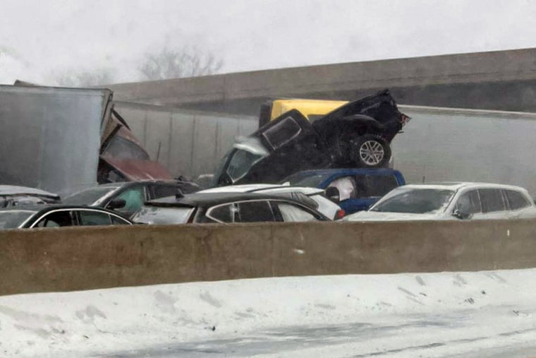 A black pickup truck on top of the pileup on the Ohio Turnpike on Friday.