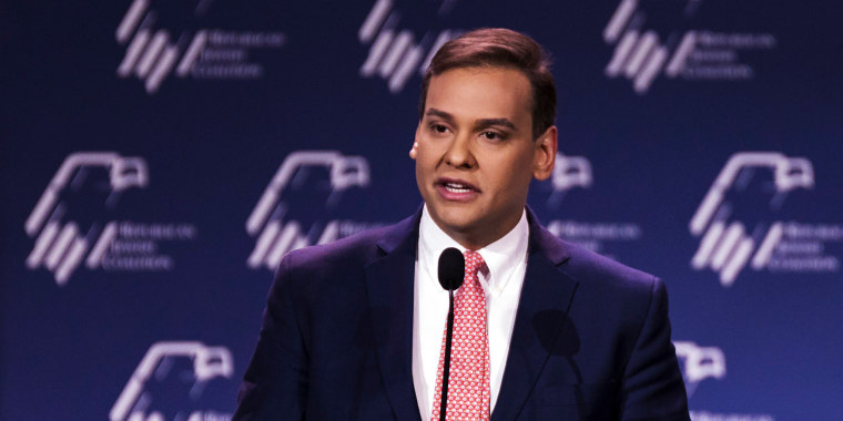 Image: George Santos addresses a Republican Jewish Coalition meeting. 