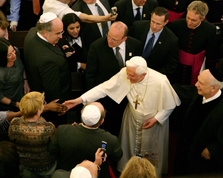 Pope Benedict XVI shakes hands  during his visit to Park East Synagogue in New York on April 19, 2008. 