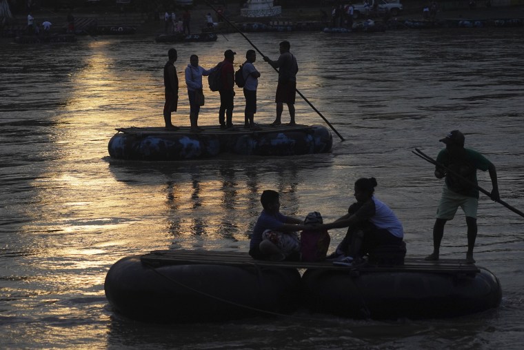 Venezuelan migrants cross the Suchiate River on the border between Guatemala and Mexico, near Ciudad Hidalgo, Mexico, 