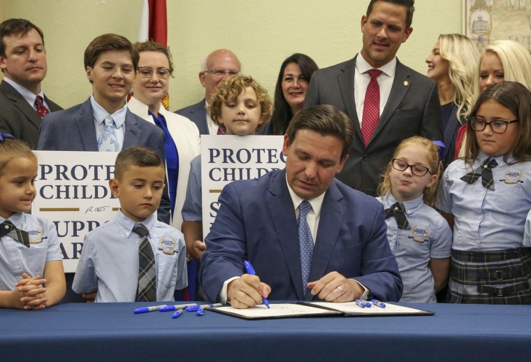 Gov. Ron DeSantis signs the Parental Rights in Education bill at Classical Preparatory school
