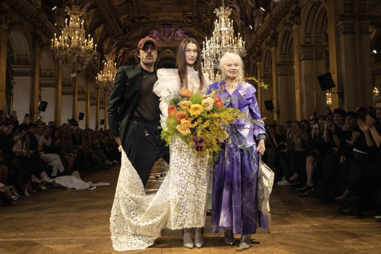 Designer Andreas Kronthaler, model Bella Hadid, and designer Vivienne Westwood at the conclusion of Westwood's fashion collection during Women's fashion week Fall/Winter 2020/21 presented in Pa on, Feb. 29, 2020.