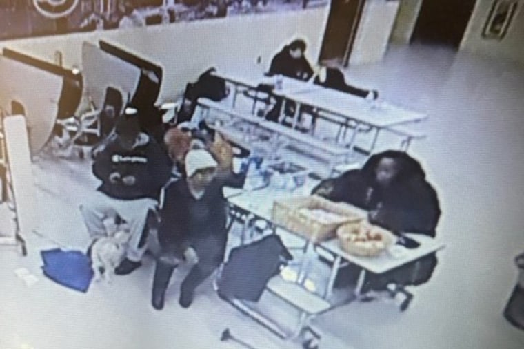 Surveillance video shows people caught in the storm taking shelter at Pine Hill School in Cheektowag, New York.