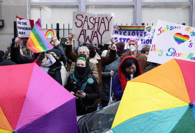 Demonstrators gather for a protest in support of the Drag Story Hour outside the Queens Public Library