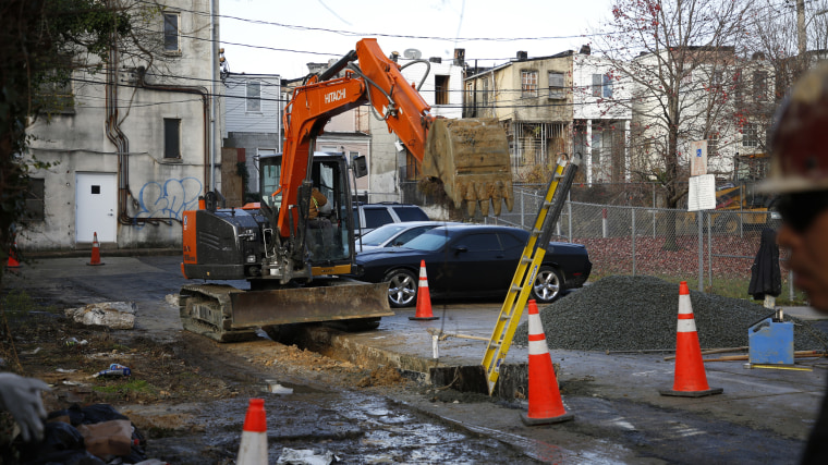 Construction workers repair water infrastructure in Baltimore.