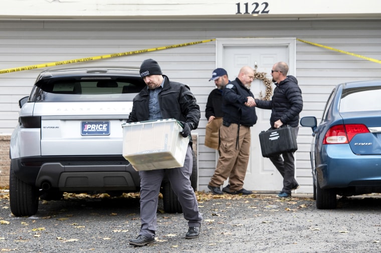 Officers investigate the deaths of four University of Idaho students
