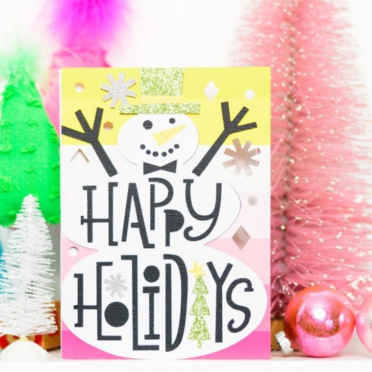 card with snowman and 'happy holidays' message