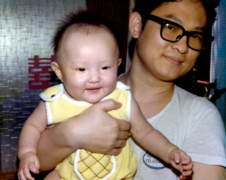 Nancy Wang Yuen as a baby, pictured with her father.