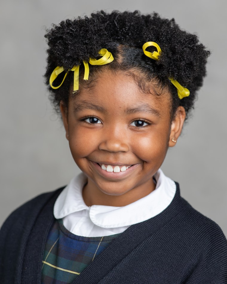 Carleigh's school photo from this year, taken shortly before most of her hair fell out.