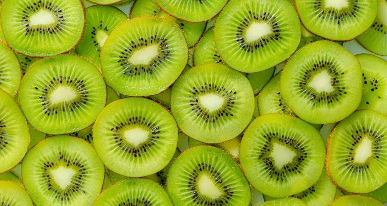 Kiwi macro, fresh kiwi fruit slices used for background