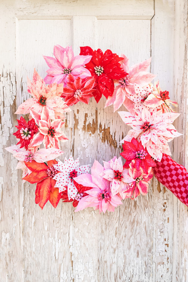 pink, red and white poinsettia wreath