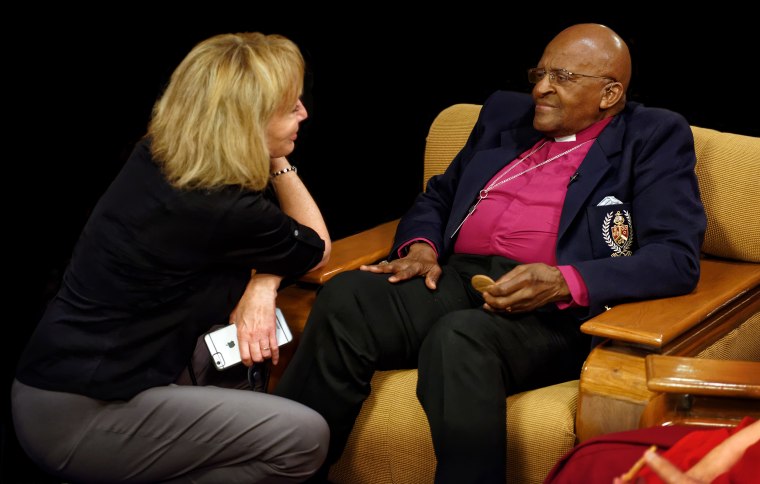 Callahan during filming with Archbishop Desmond Tutu, who died in December 2021.