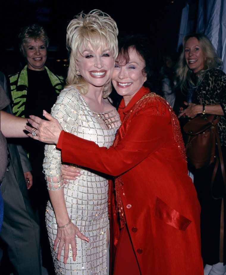 Dolly Parton with Loretta Lynn at the Grand Ole Opry in Nashville, TN in 1997.