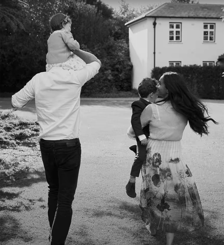 Lilbet on the shoulders of her father, Prince Harry, walking along side mom Meghan Markle and brother Archie.