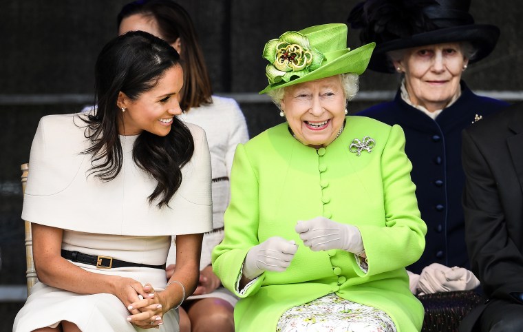 Queen Elizabeth II with Meghan Markle during a ceremony.