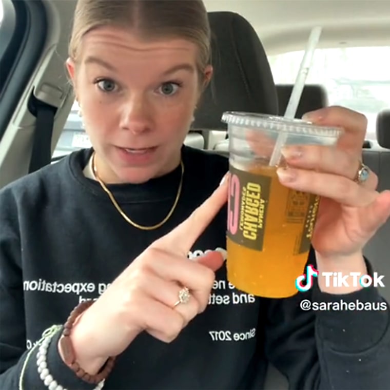 Sarah Baus with her caffeine-packed Mango Yuzu Citrus Charged Lemonade.