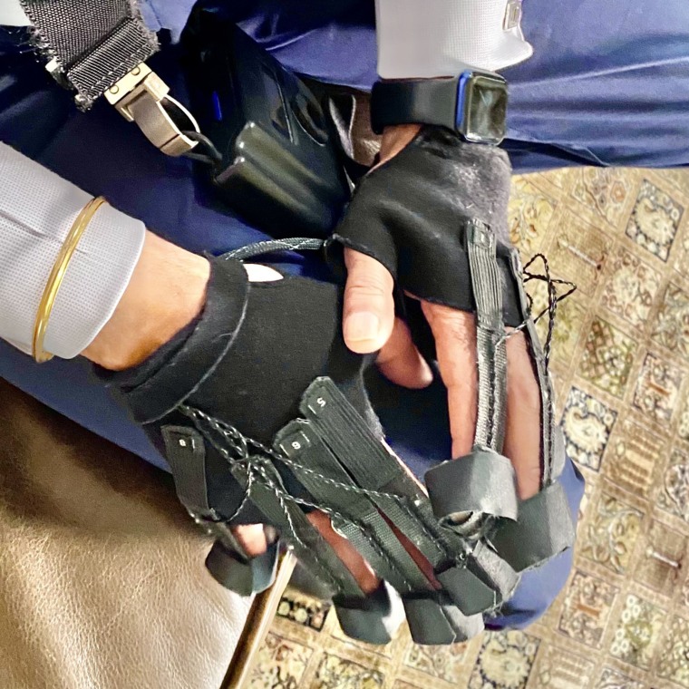 The gloves deliver a pattern of vibrations that reset the nerves that misfire in people with Parkinson's disease.