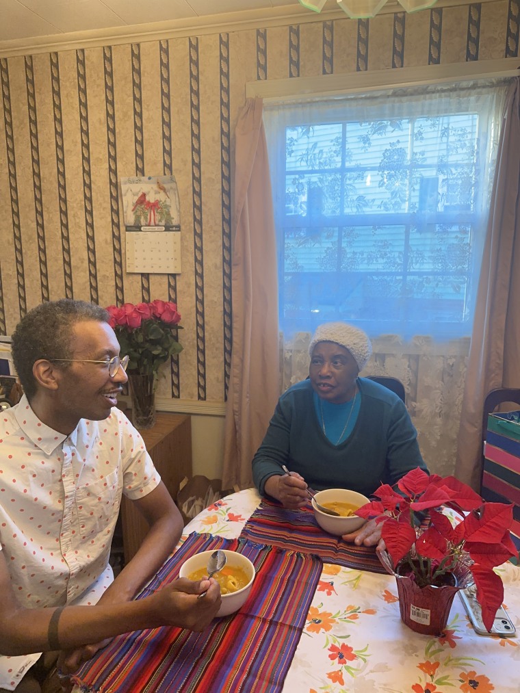 My mother Marie and I enjoying the soup joumou we made together.