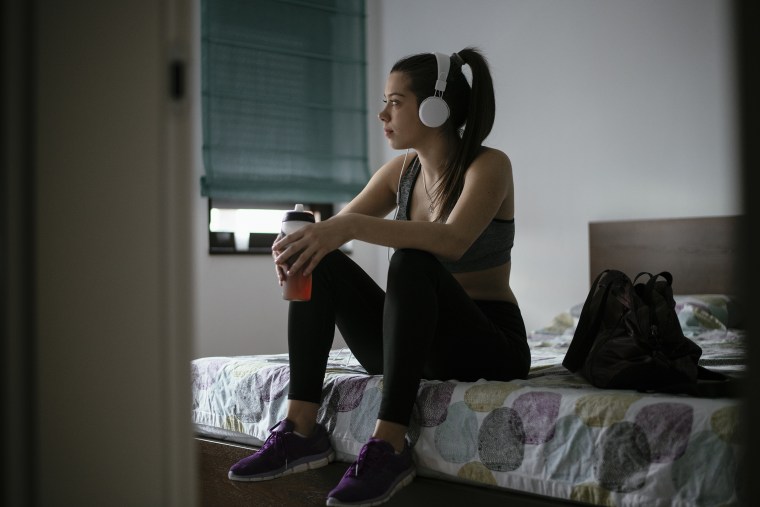 Young woman preparing for the training.