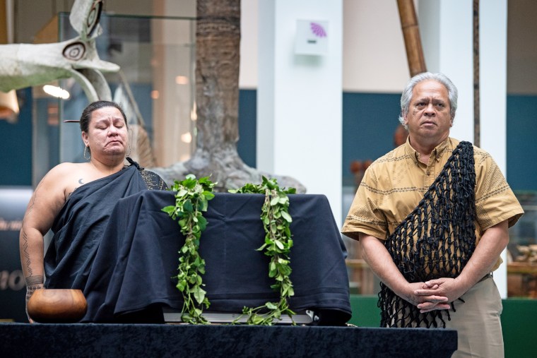 Edward Halealoha Ayau, right, was part of a Hawaiian delegation that traveled to Germany in 2022 to accept the return of human remains from a museum in Bremen. 