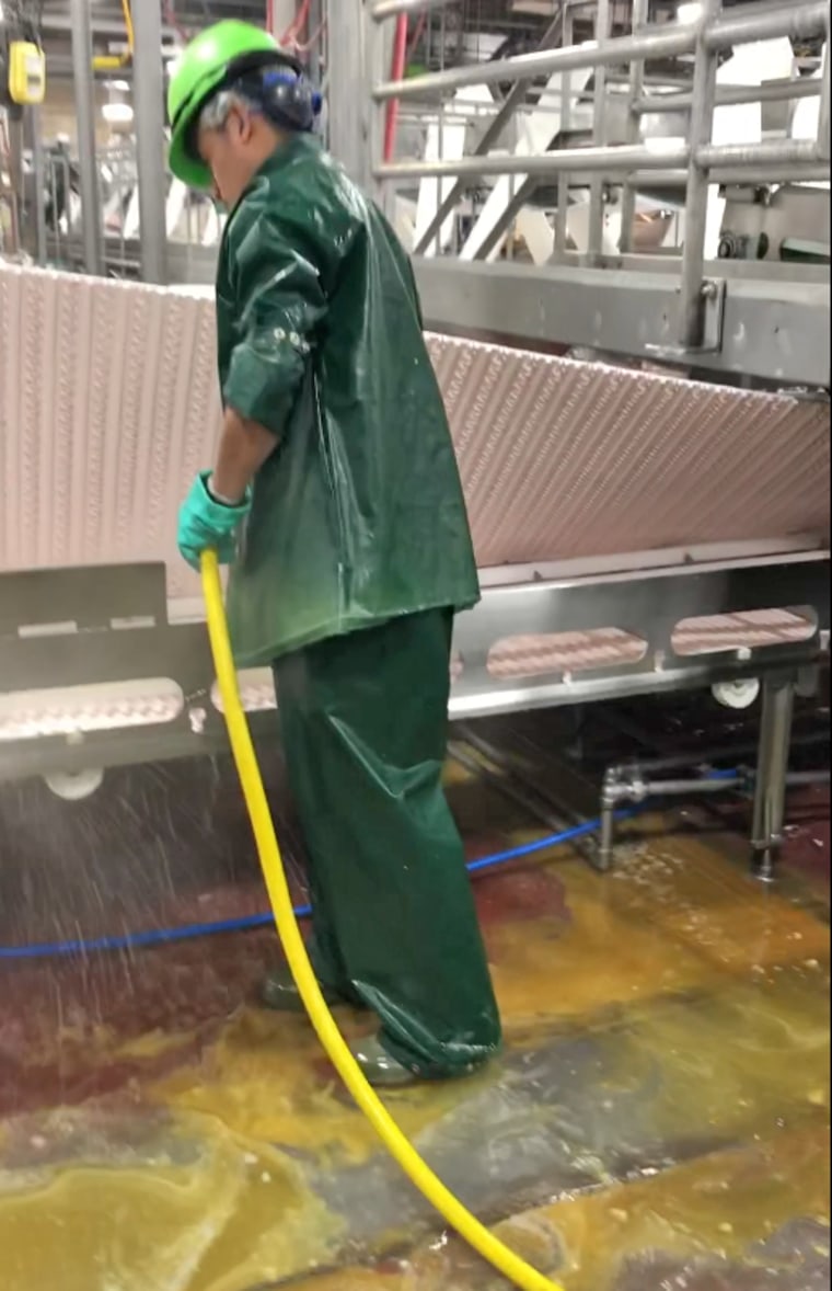 A worker at the JBS Foods plant in Grand Island, Neb.