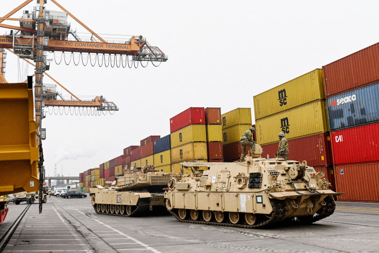 M1A2 Abrams battle tanks of the US army that will be used for military exercises by the 2nd Armored Brigade Combat Team, is unloaded at the Baltic Container Terminal in Gdynia on December 3, 2022. 