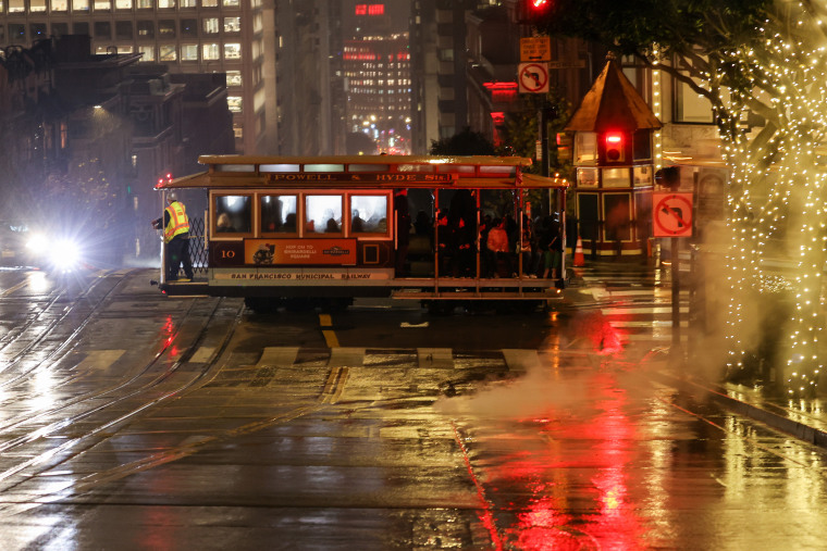 A cable car on Nob Hill, San Francisco, as heavy rain hits the area.