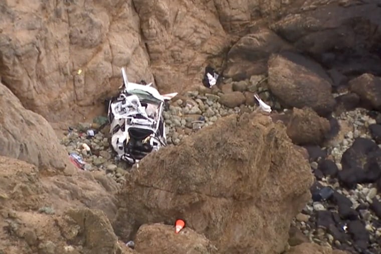 Four people were rescued after a Tesla plunged over a cliff in California on Monday.