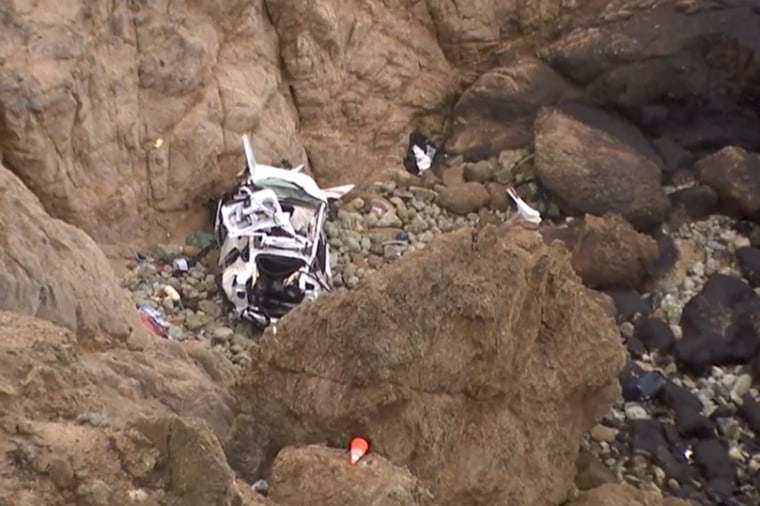 Four people were rescued after a Tesla plunged off a cliff in California on Monday.