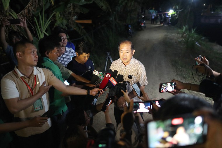 Doan Tan Buu, deputy chairman of the Dong Thap provincial peoples committee, speaks to the media in Dong Thap province on January 4, 2023, as news emerged of the death of a boy trapped in a deep shaft at a construction site who rescuers had been trying to reach. - The Vietnamese boy trapped in a buried hollow concrete pillar at a construction site has died, an official said late January 4, amid efforts to pull up the body. 