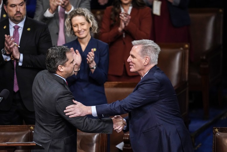 IMAGE: Senator Mike Garcia (R-Calif., left) shakes hands with congressmen. California Republican Kevin McCarthy nominated him for the twelfth ballot in the House, which meets on the fourth day to elect a speaker and open the 118th Congress on Jan. 11.  6th of 2023.