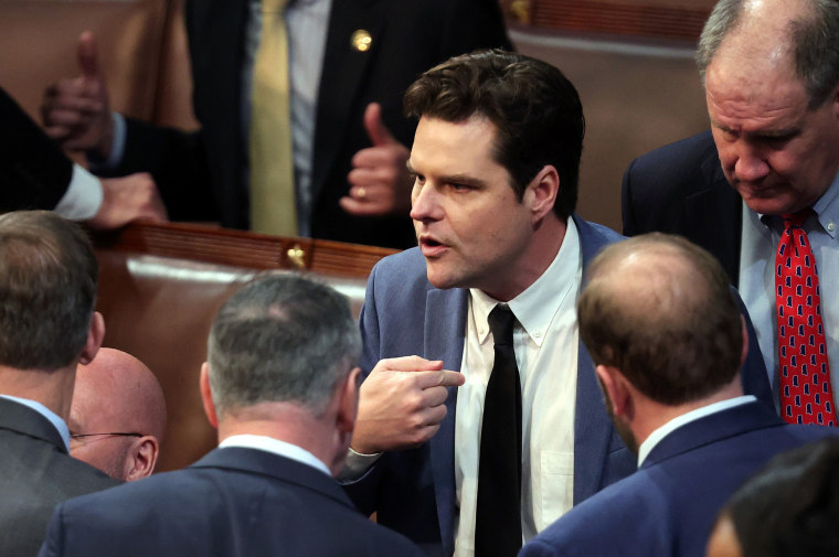 Rep. Matt Gaetz talks to fellow House members during the second day of elections for Speaker of the House