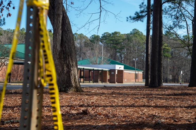 Police tape hangs from a sign post outside Richneck Elementary School