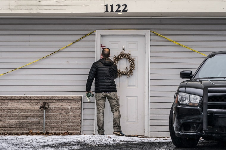 Image: A worker leaves the crime scene at the site of a quadruple murder on Jan. 3, 2023 in Moscow, Idaho. 